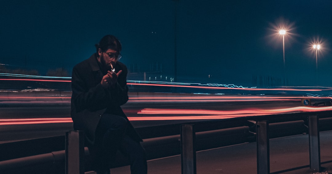 businessman smartphone night city