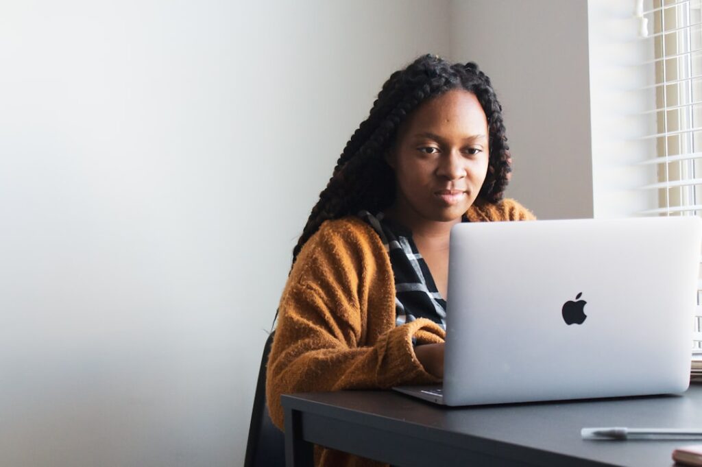woman working laptop web design home desk