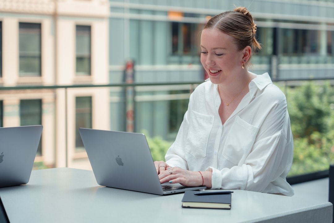 business professional reading reviews on laptop
