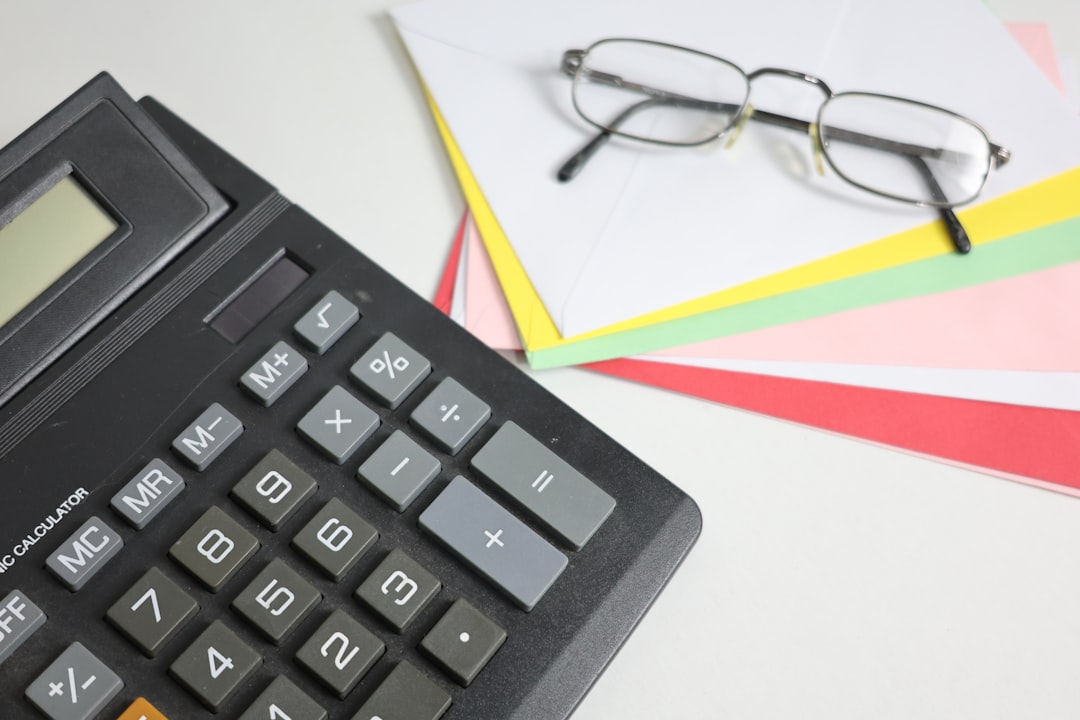 calculator and money financial planning desk