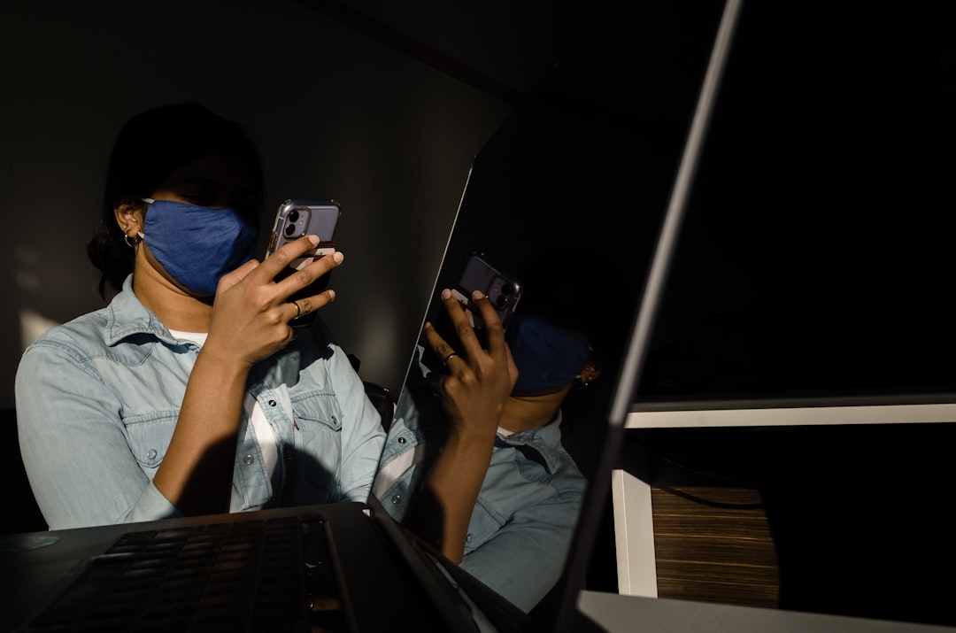 frustrated developer checking phone late at night