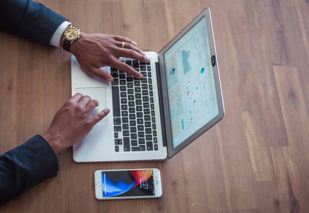 businessman making powerpoint slides laptop