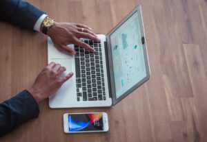 businessman making powerpoint slides laptop