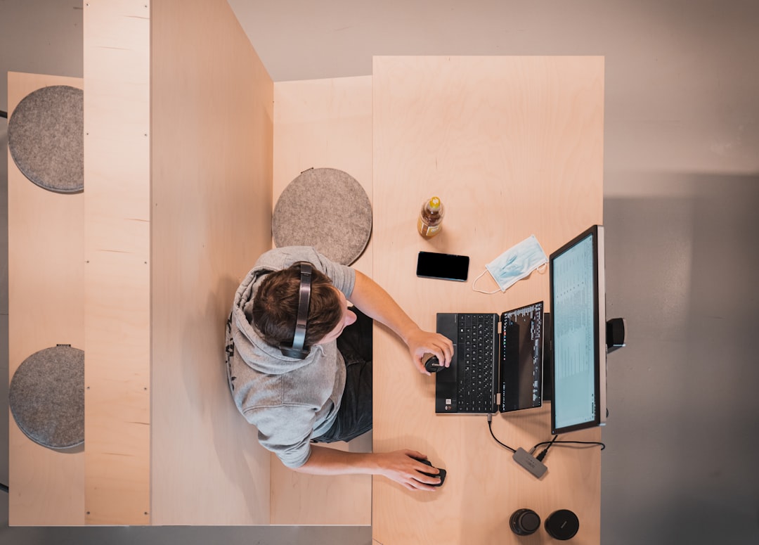 person working laptop home office remote