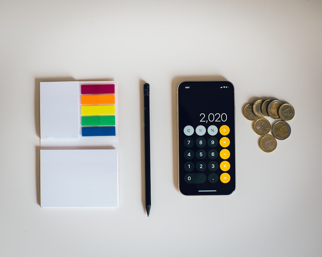 calculator coins income planning desk