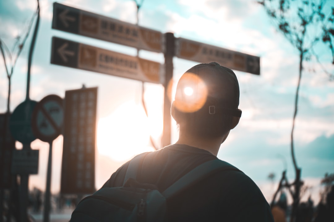 person thinking at crossroads decision