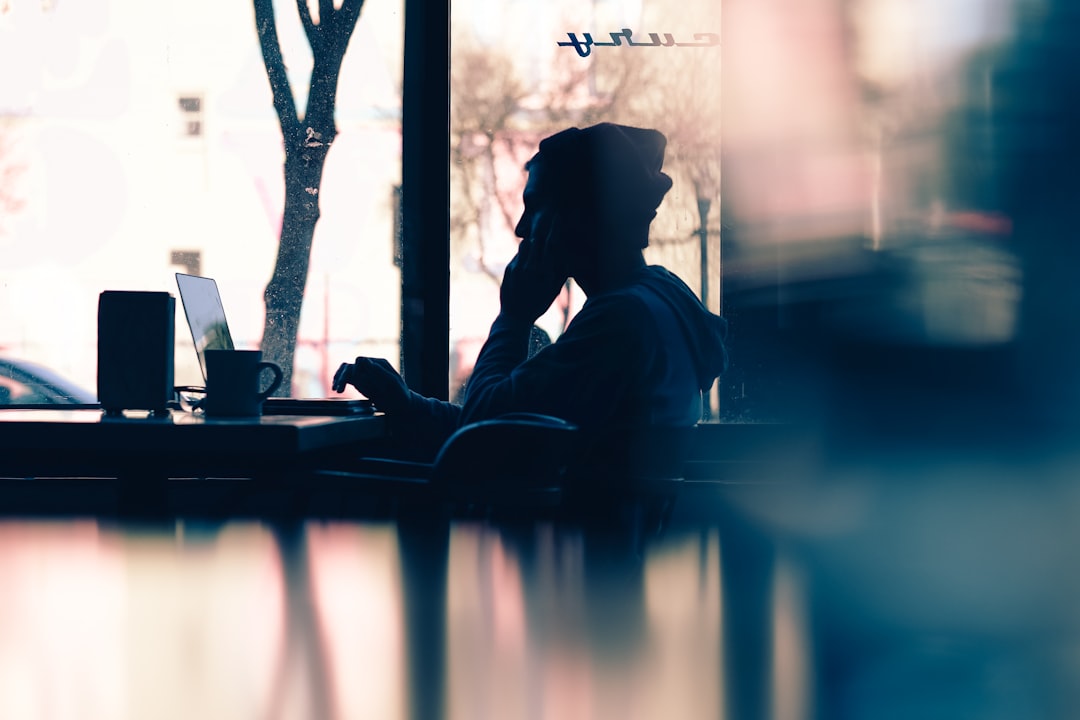 confident freelancer working cafe