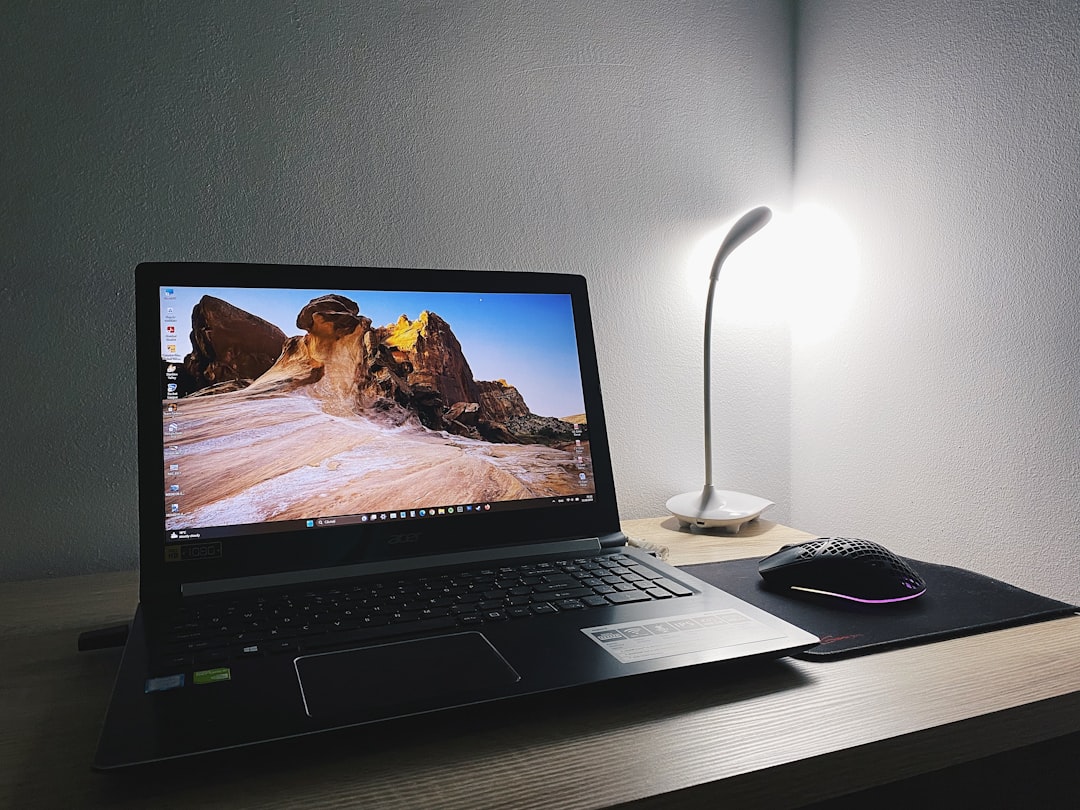night desk laptop editing video freelance