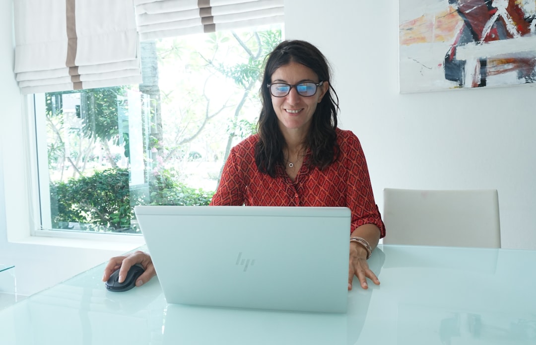 woman working laptop home desk