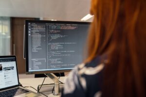 cloud engineer studying laptop code