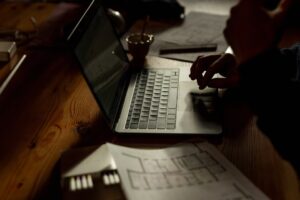 businessman working laptop home office night