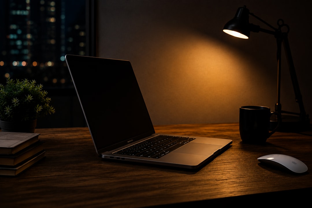 person studying laptop late night home