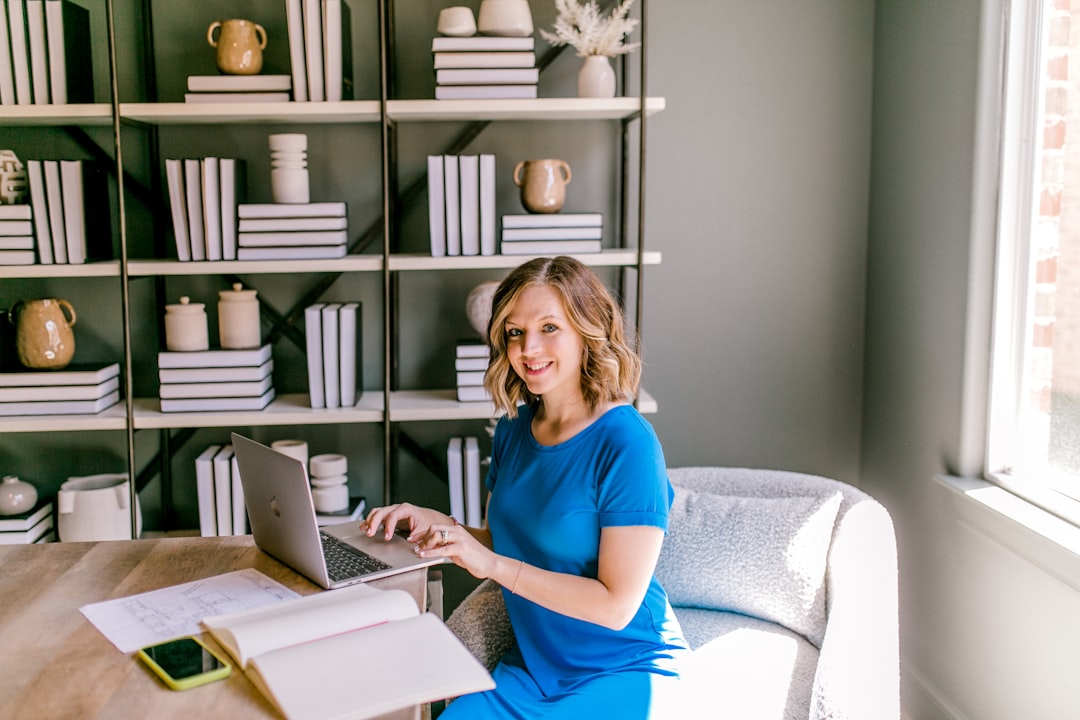 freelance writer confident smiling home office