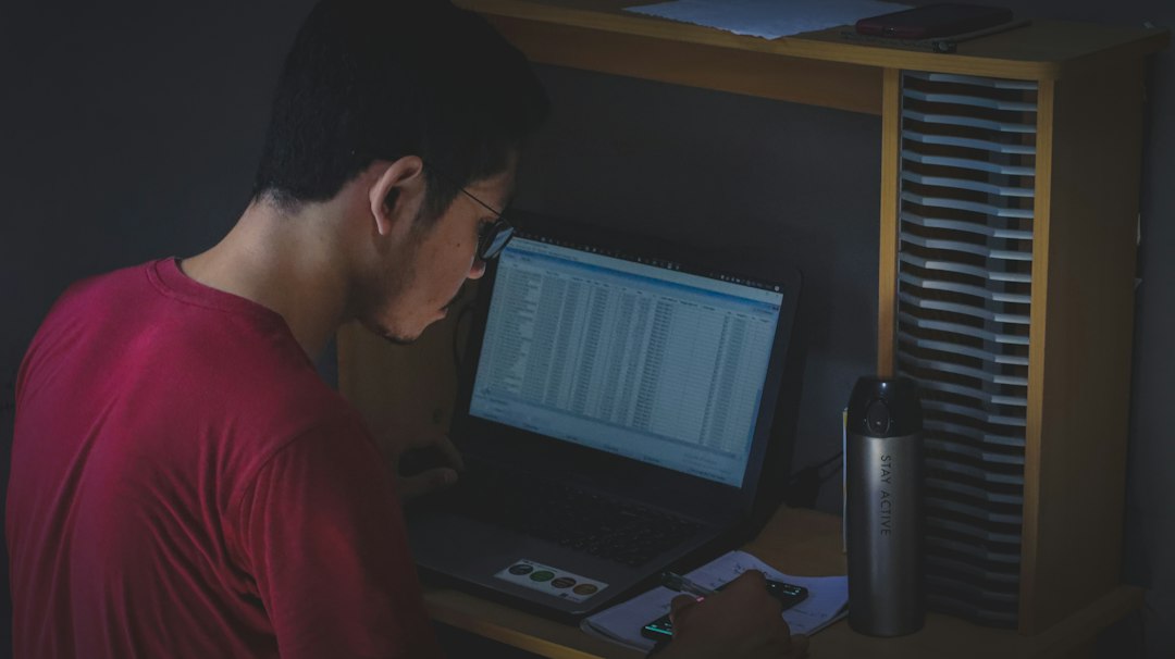 stressed freelance developer working alone at night