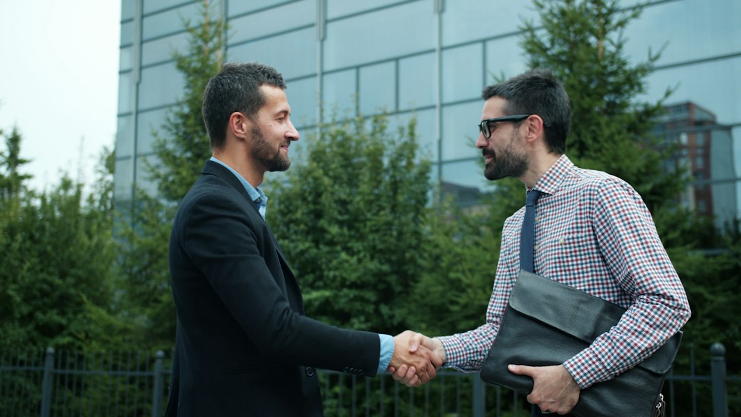 employee returning to office handshake