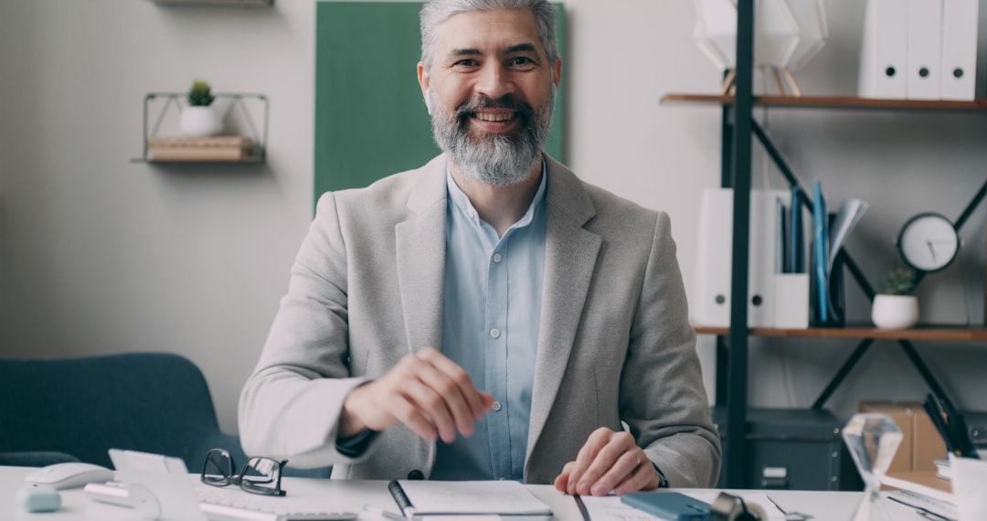 confident middle aged businessman office