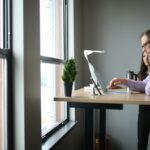 businessman thinking at desk office window