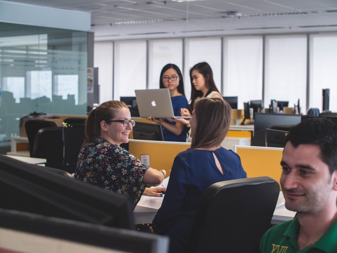 diverse professionals working office
