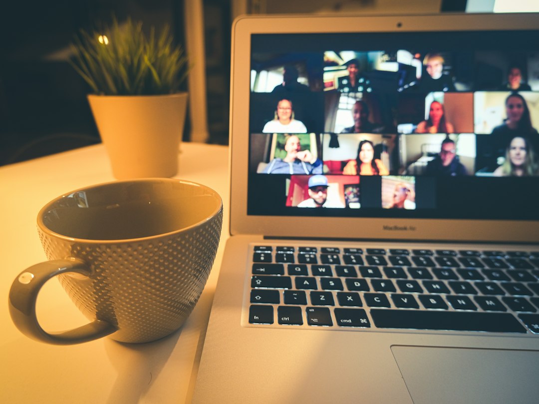 online video call meeting laptop home