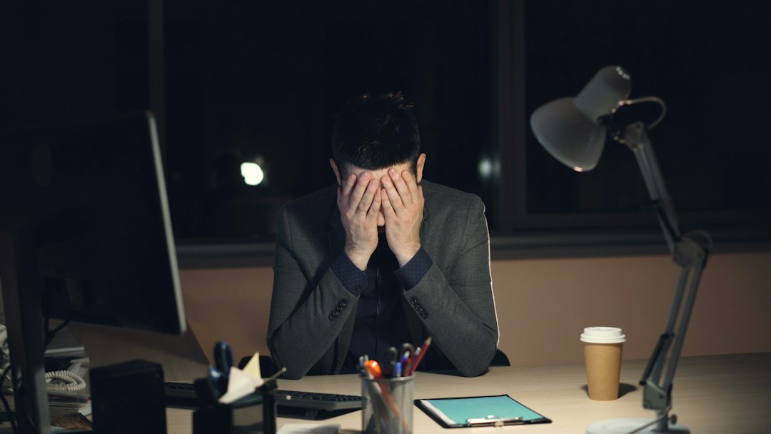 frustrated employee at office desk