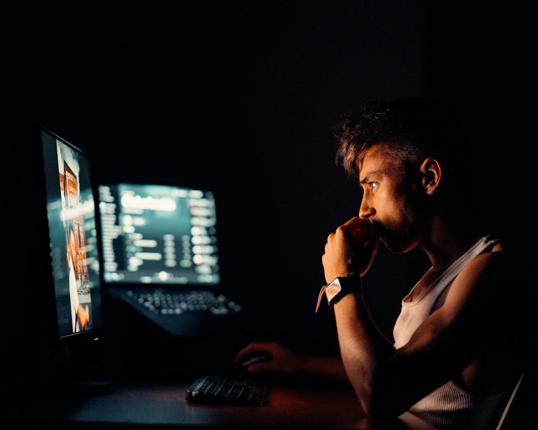 stressed freelance developer working alone at night