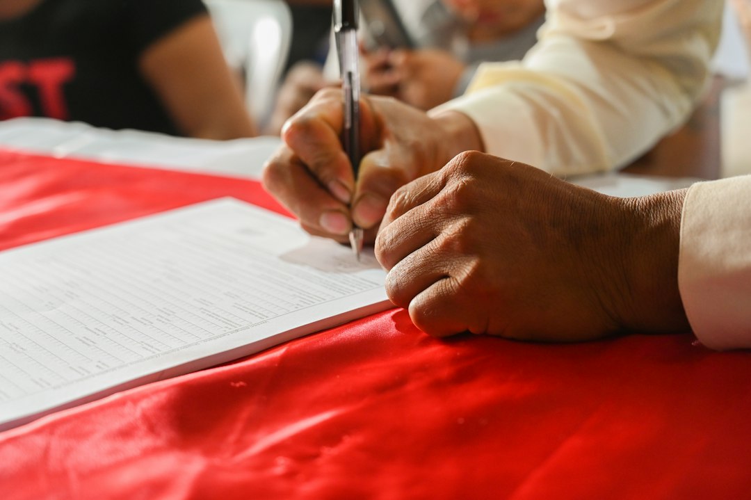 person signing up online registration