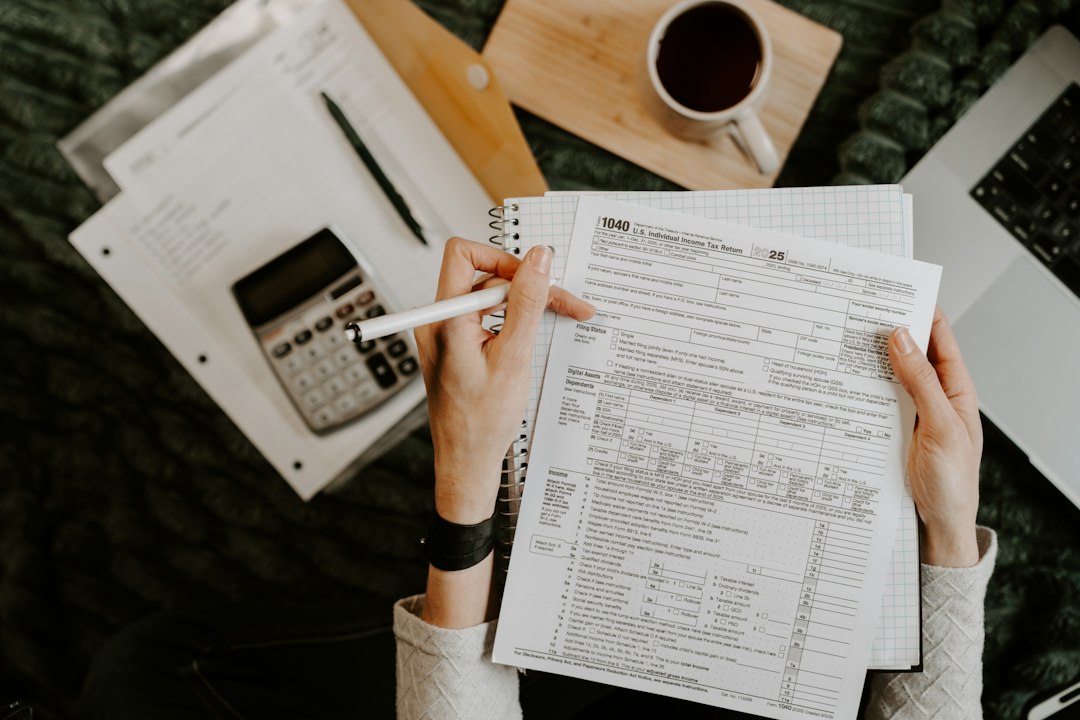 person reviewing tax documents at home