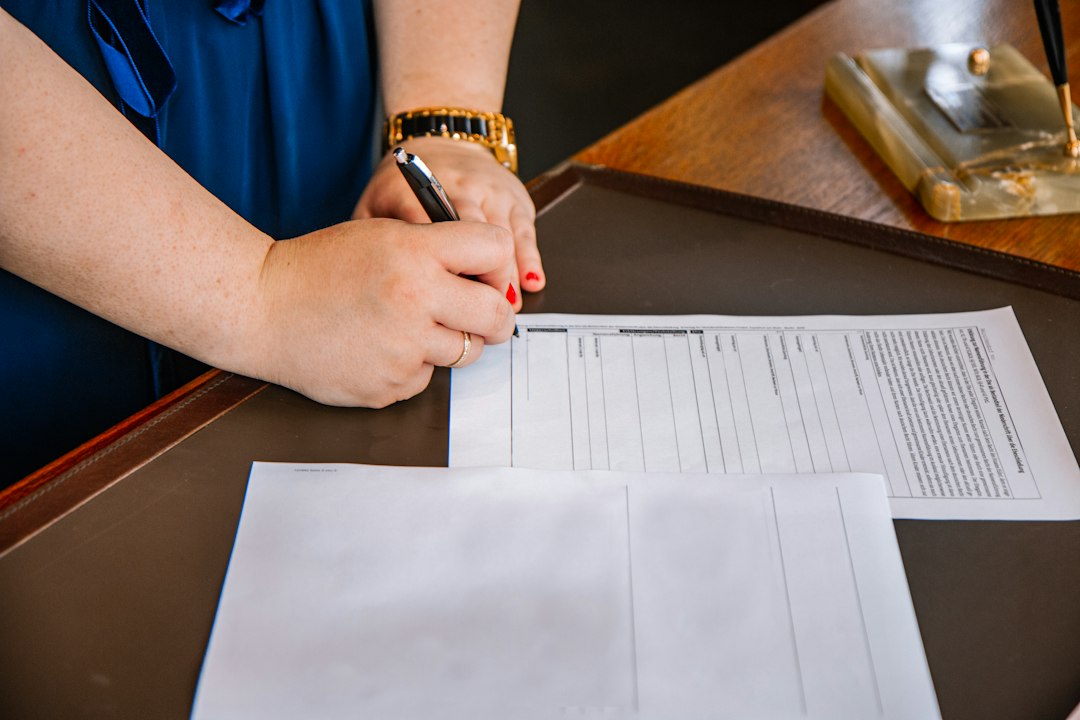 employee reading contract document